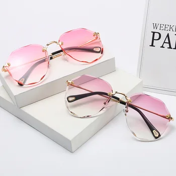 JAUNU Oculos De Sol Nelegālo Saulesbrilles Sieviešu Zīmola Dizainere Slīpums Modes Saules Brillēm, Sieviete bez apmales Metāla Izliektu Tempļi